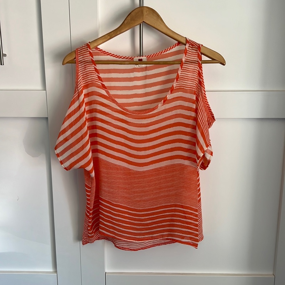 One clothing. Cut out too. Size Medium
